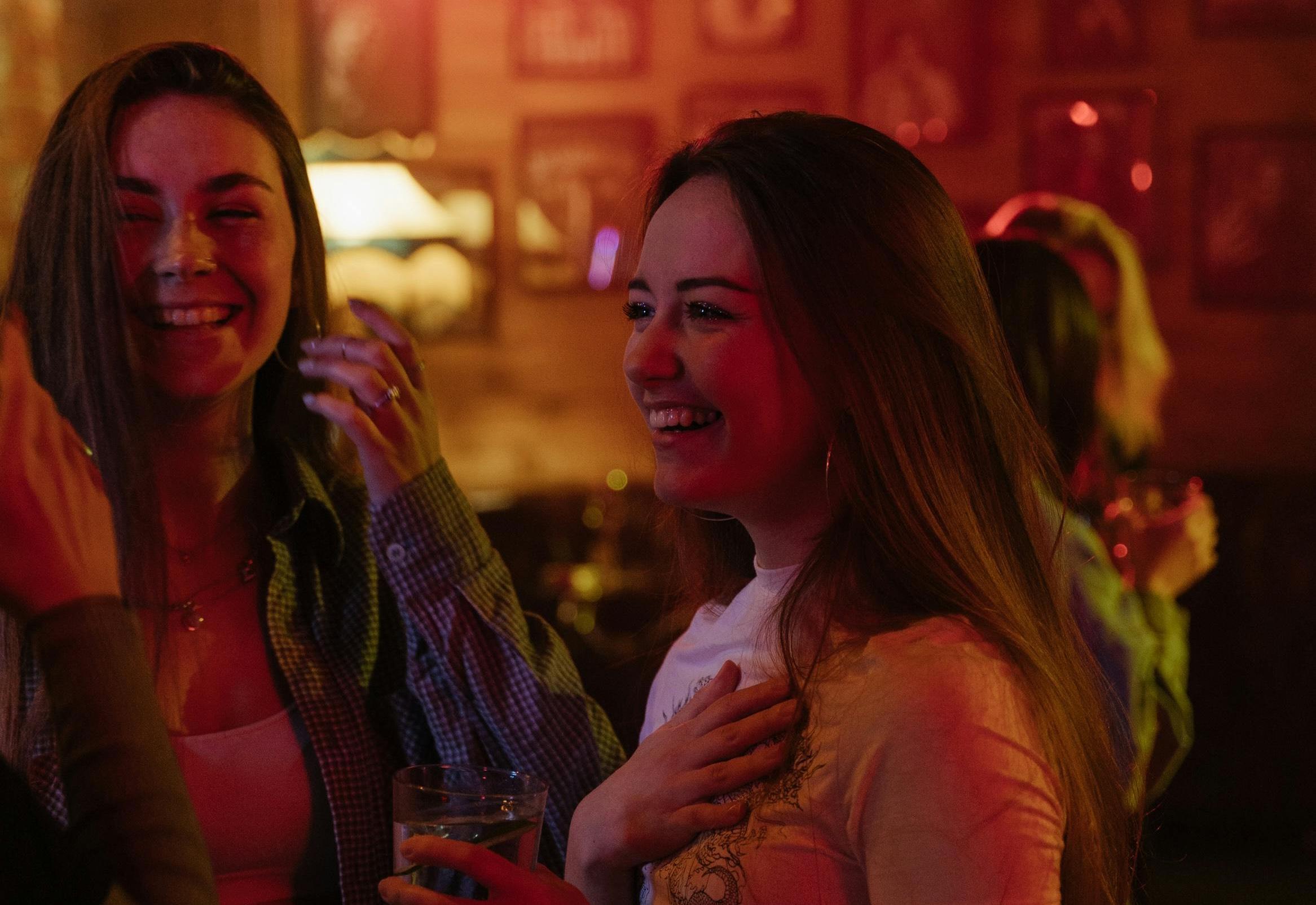 Women having conversations in a social setting